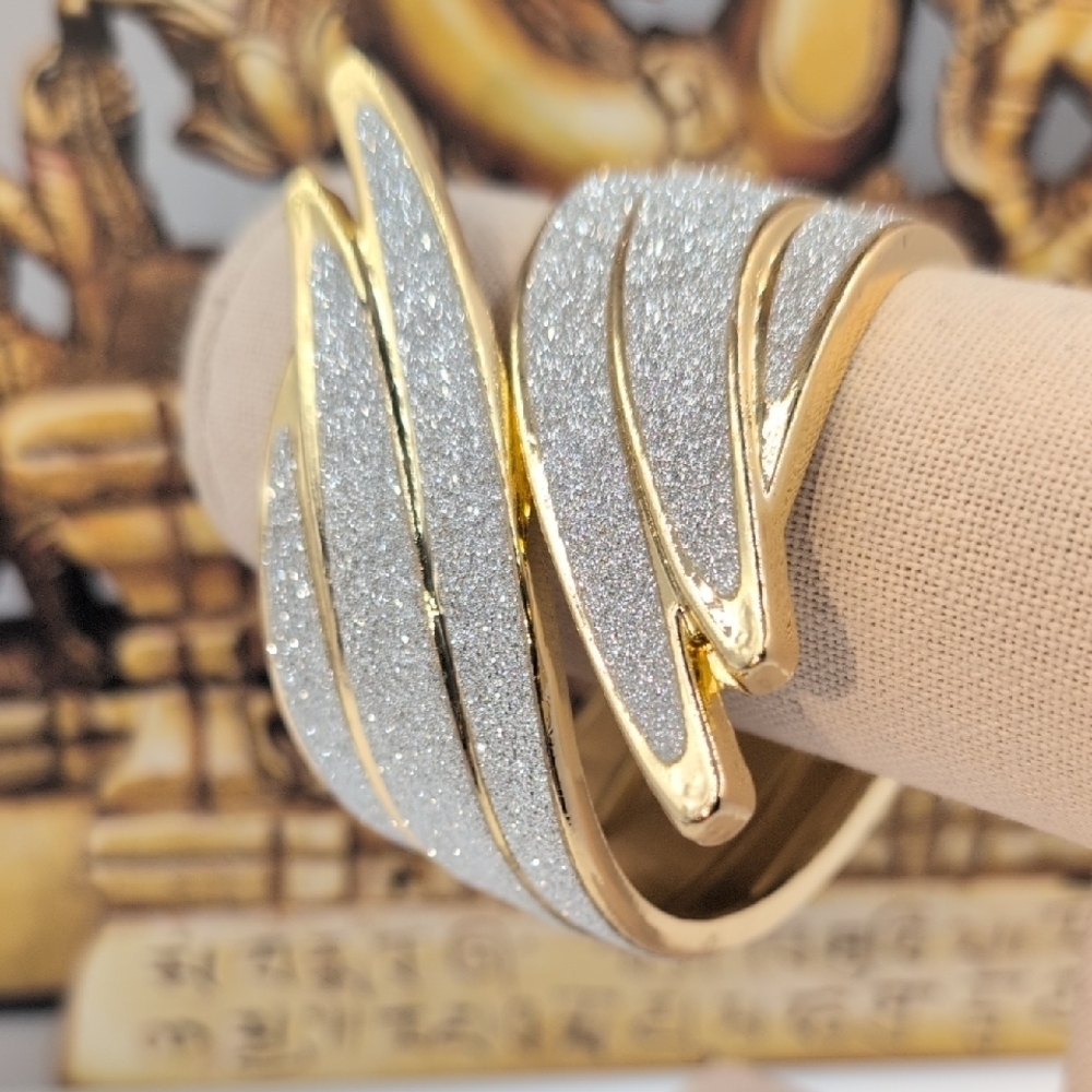 Elegant Gold and Silver Interwoven Hinged Bracelet